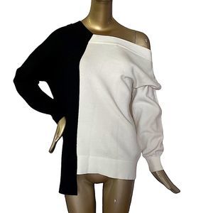 Alice + Olivia black and white color block knit top/sweater. Size Small